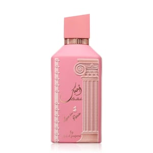 Pink perfume bottle with decorative elements on a white background