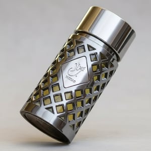 Metallic shaker with geometric pattern on a white background