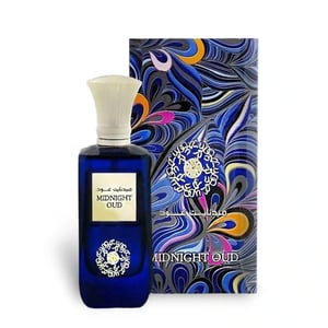 Blue perfume bottle with decorative packaging on a white background