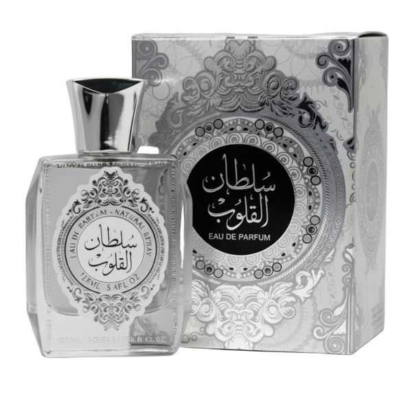 sultan al quloob Perfume bottle and packaging with intricate designs on a white background