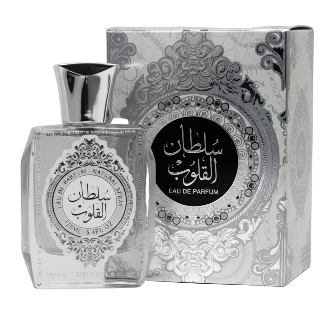sultan al quloob Perfume bottle and packaging with intricate designs on a white background