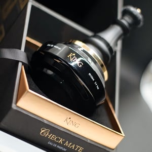 Perfume bottle labeled 'King' in a decorative box with gold accents. King Armaf for men 100ml EDP
