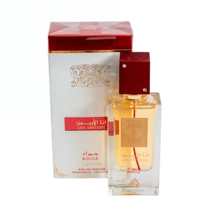 Perfume bottle and packaging with gold and red design on a white background Ana Abiyedh Rouge Lattafa Perfumes for women and men