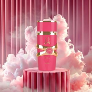 Kotak Yara Candy Pink and gold cosmetic product on a pink platform with a pink cloud background
