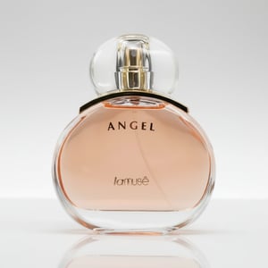 Perfume bottle labeled 'Angel' by la muse on a white background