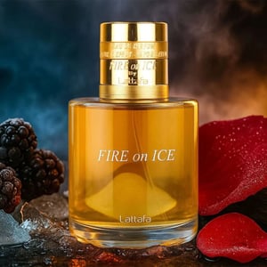 Perfume bottle labeled 'Fire on Ice' with berries and a red leaf on a dark background