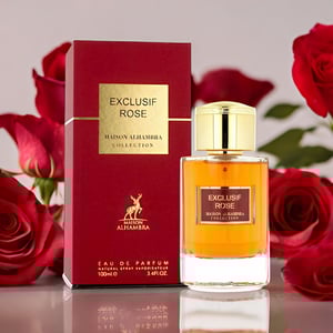 Exclusif Rose perfume bottle and packaging with red roses in the background