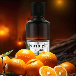 Perfume bottle labeled 'Fortnight For Men' surrounded by oranges on a warm-toned background