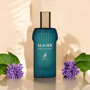 Blue Glacier Pour Homme perfume bottle with purple flowers and green leaves on a beige background