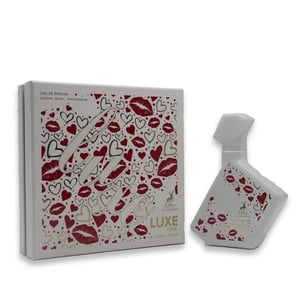 Luxe Chic perfume bottle and packaging with heart and lip designs on a white background