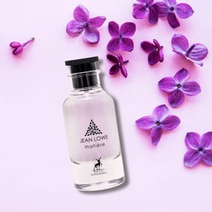 Jean Lowe perfume bottle with purple flowers on a light pink background