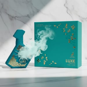 Perfume bottle broken, icy mint fog emerging; studio on white marble Malaysia &mdash; clear bottle and box, cinematic lighting.