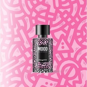 Perfume bottle labeled 'MOOD' on a pink patterned background