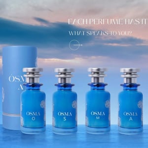 Set of blue perfume bottles with silver caps on a reflective surface, against a sky background.