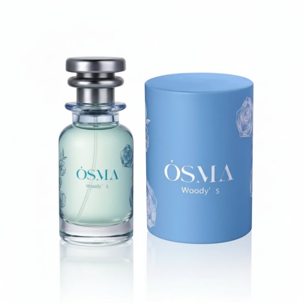 OSMA perfume bottle and packaging on a light blue background with ingredient labels.