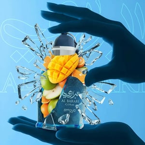 Unisex perfume bottle floating on coral-lit shallow pool tropical Malaysia &ndash; Al Barari Coral