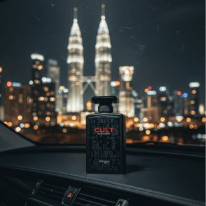 Cult by Zimaya perfume bottle on car dashboard with KL skyline lights modern men scent Malaysia