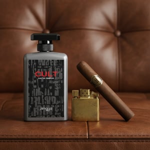 Cult by Zimaya perfume bottle on leather couch with cigar and lighter men fragrance Malaysia