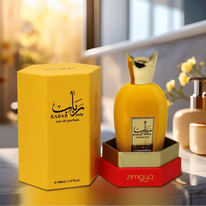 rabab pulp zimaya perfume bottle with gold cap and packaging on a reflective surface.