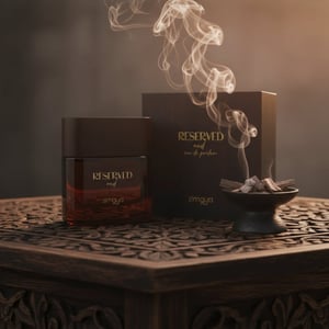 Reserved Oud by Zimaya perfume bottle with oud chips smoke and amber light unisex fragrance Malaysia